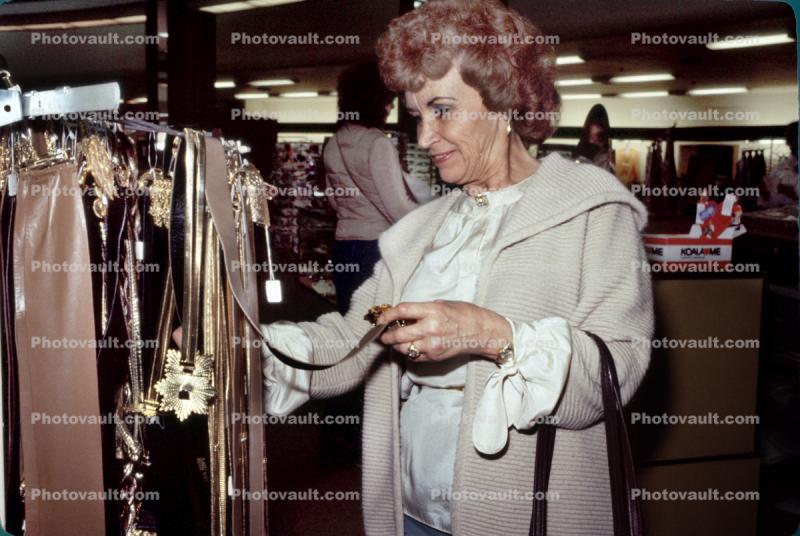 Belts, Woman, Shopping Mall, interior, inside, indoors, shopper, clothing store, racks, 1980s