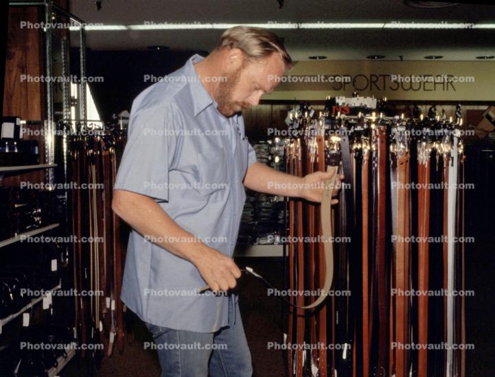 Belts, Man, Shopping Mall, interior, inside, indoors, shopper, clothing store, racks, 1980s