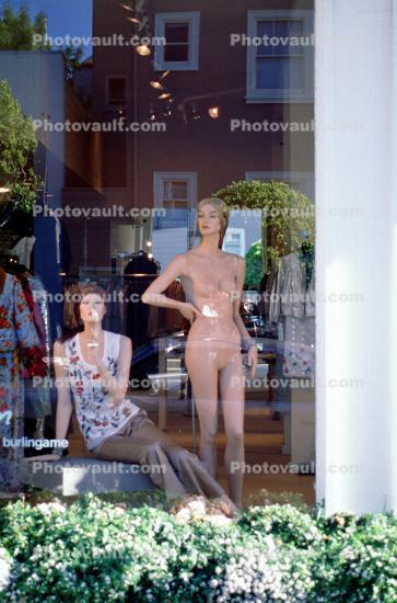 Naked mannequin, window display, glass