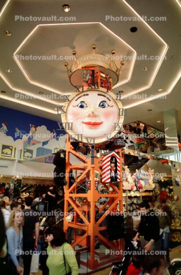 Neon Clock, happy face, crowds, mall