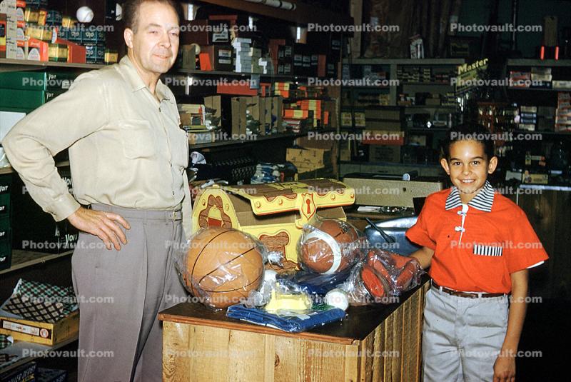 Sports store, Boy, clerk, Mr. Wheeler, Arcadia Sporting Goods, December 16, 1958, 1950s