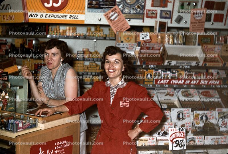 Cashier, Women, Camera Store, film, counter, 1950s