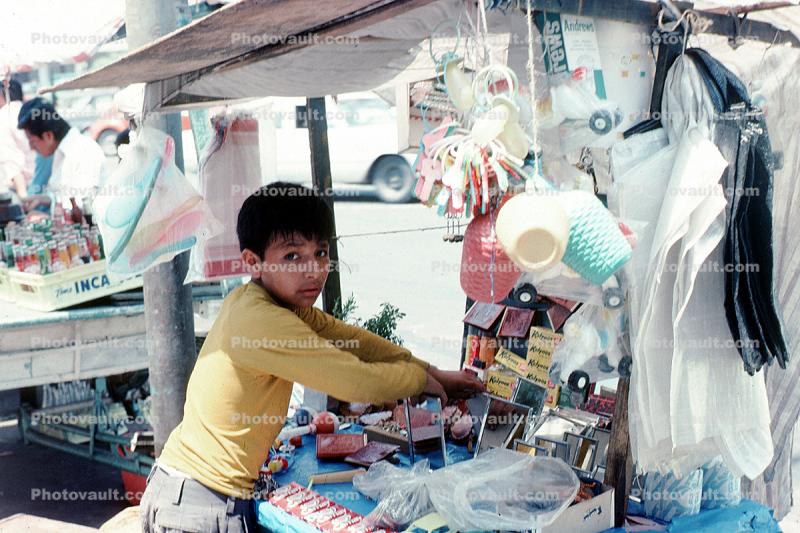 Boy Vendor, Trinkets, Child Labor, shack, curious, Lima Peru