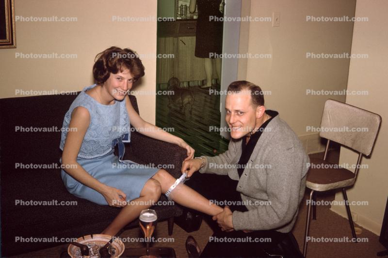 Woman and Man Playing Around with Garter, 1950s