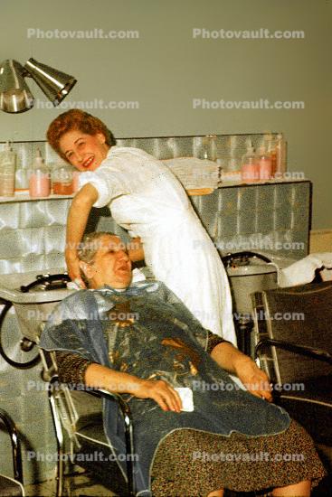 Hair ash, washing, woman, perm, perming, beautician, 1950s