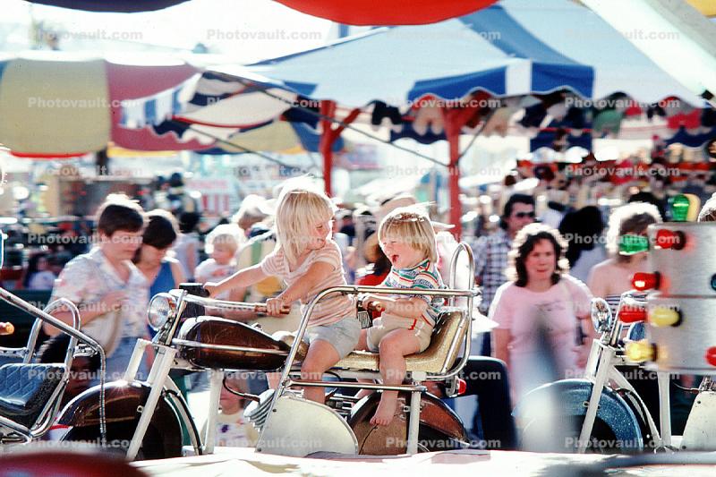 motorcycle ride, Smiling Girl, boy, motorcycle ride, County Fair