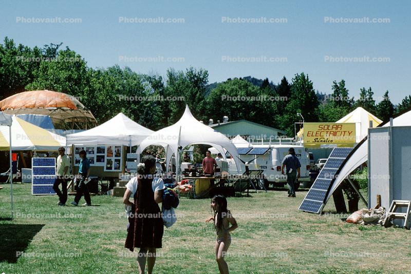 SolFest, Tents, solar panels, woman, girl, Hopland, Mendocino County, July 24 1994