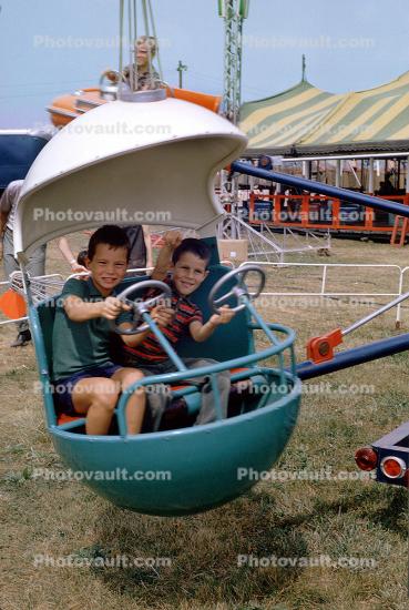 A Ride at a County Fair, boys, smile, steering, 1950s