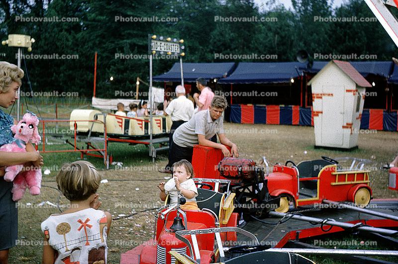 Fire Engines, firetrucks, boy, pink poodle, booth, 1950s
