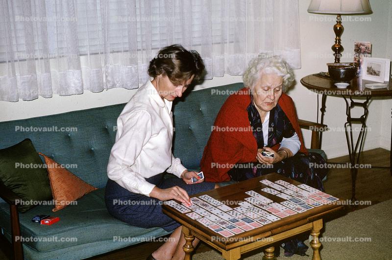 Mother and Daughter playing Solitaire, Grandmother