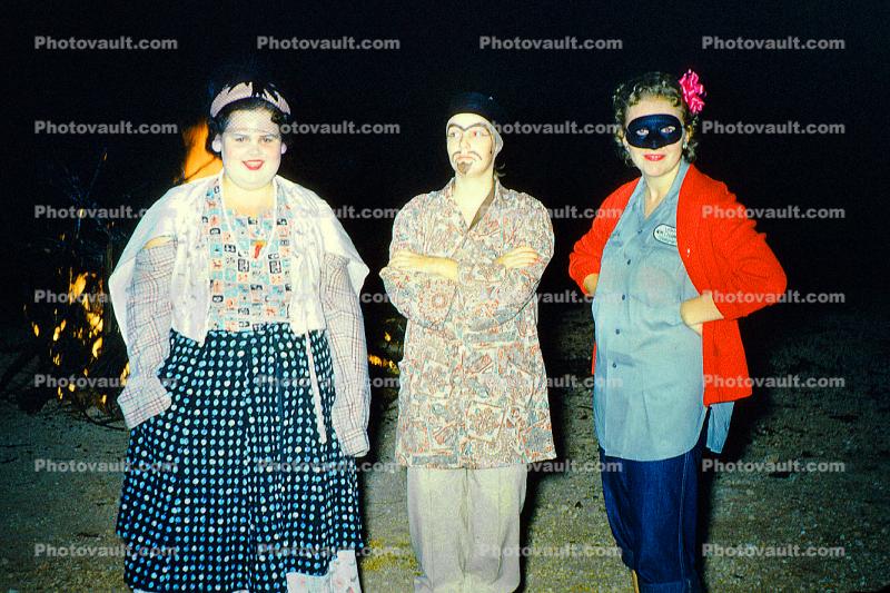 women, mask, costume, smiles,  fu-man-chu, 1950s