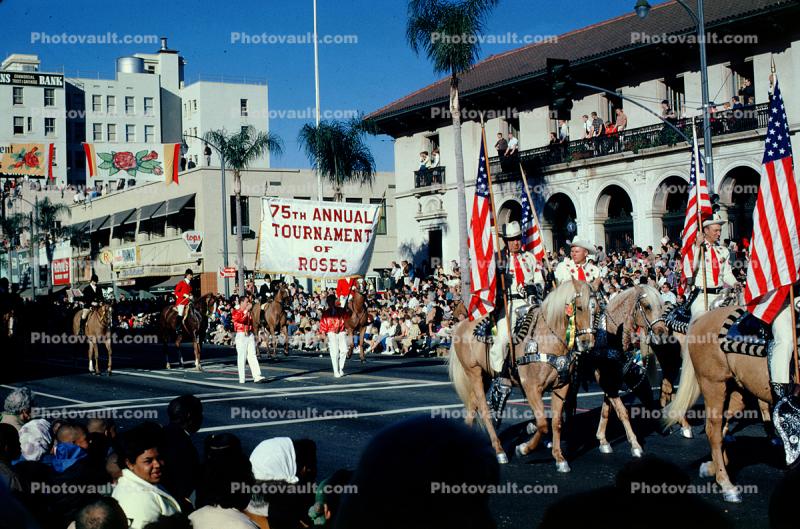 Cowboy, banner, balcony, buildings, 75th Annual Tournament of Roses, 1964