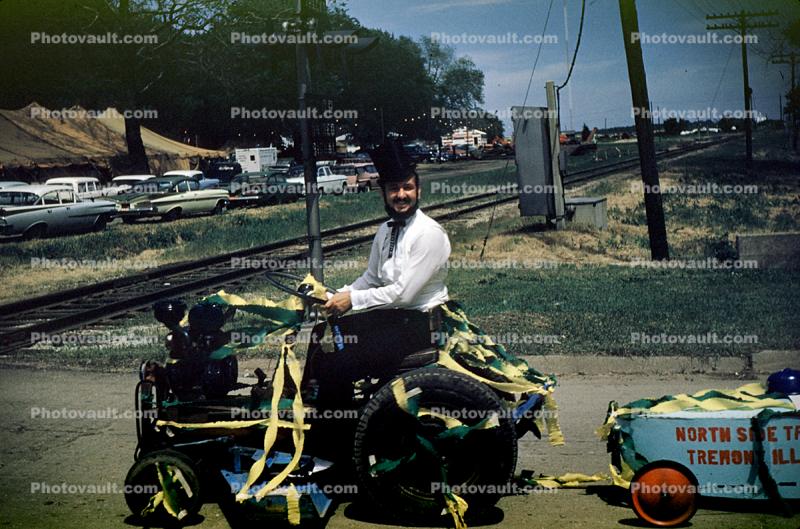 Aberaham Lincoln on a tractor, cars, June 1960, 1960s