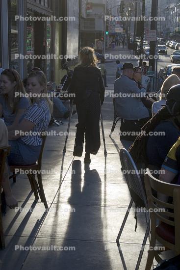 legless woman walking on crutches, Sidewallk Cafe, North-Beach