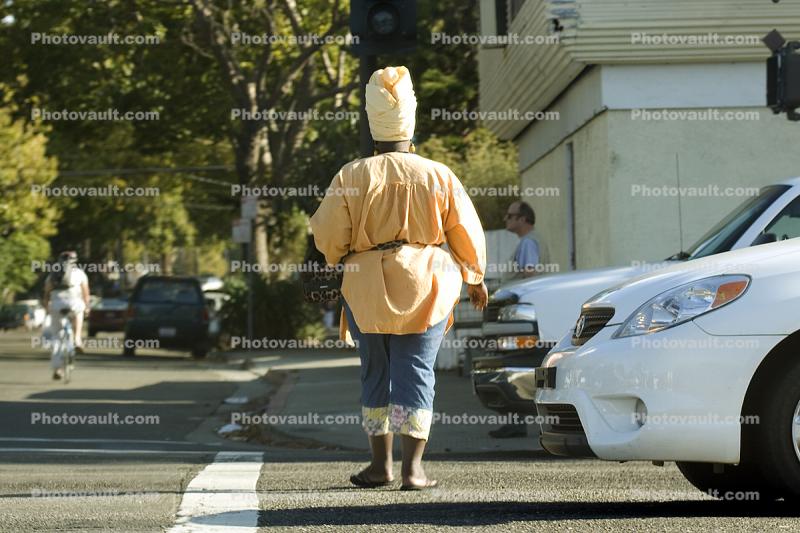 woman walking, crosswalk, Berkeley