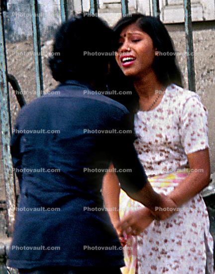 Couple arguing on the sidewalk, Woman, Saree, Mumbai