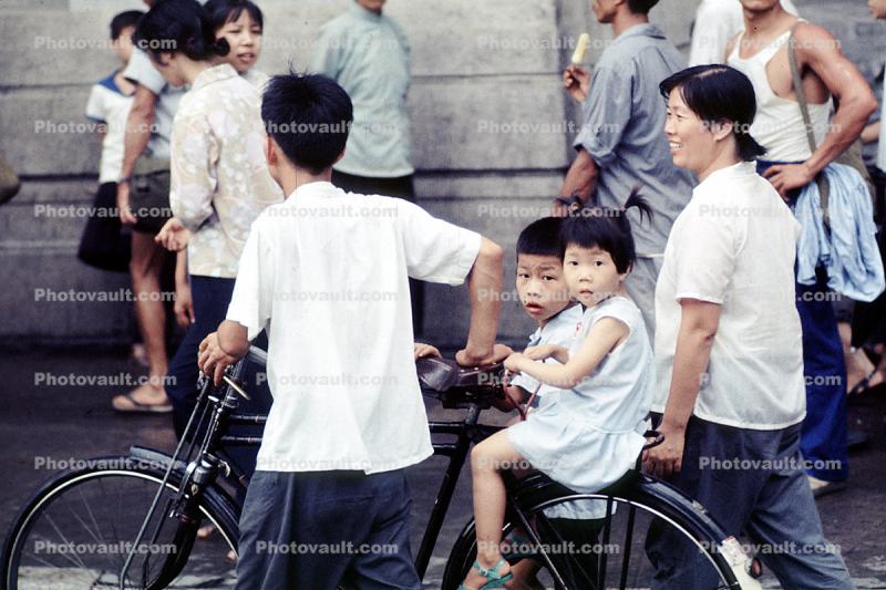 Boy and Girl on a bike