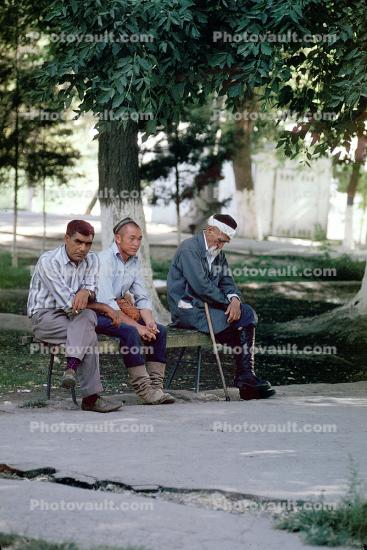 Men sitting on a bench