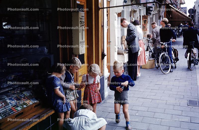 Children Playing on a Sidewalk, stores, shops, Groninger, Netherlands, September 1959, 1950s