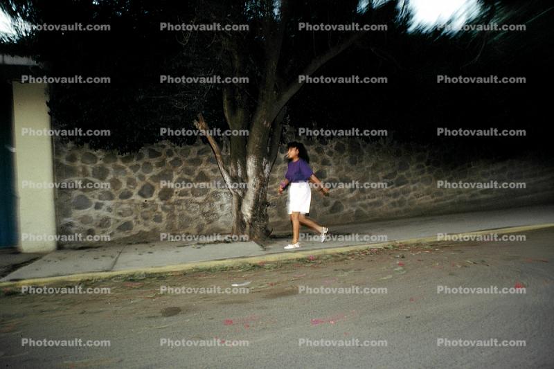 curb, Woman Walking on a Sidewalk, Tepoztlan, Morelos, Mexico