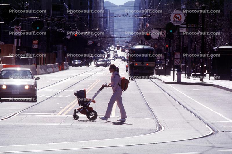 Woman, Backpack, Stroller, the end of Market Street