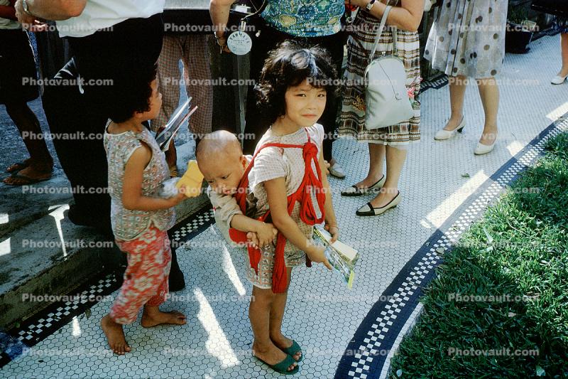 Girl, Baby, Carrying Child, September 1962, 1960s