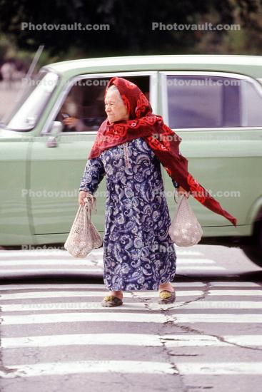Woman and Car on a crosswalk, Tashkent, Uzbekistan