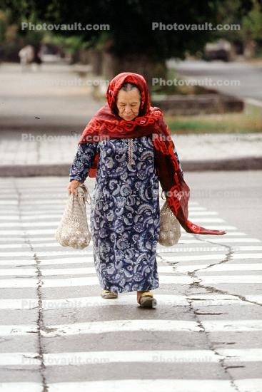 Woman on a crosswalk, Tashkent, Uzbekistan