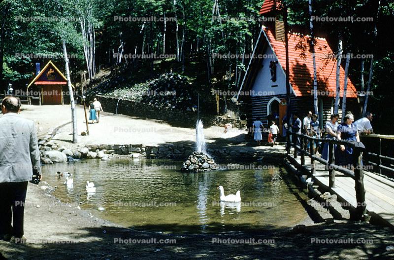 Footbridge, swans, Water Fountain, aquatics, Pond, Geese, House, Santa's Workshop, Elaine, North Pole, Adirondack Mountains, 1953, 1950s