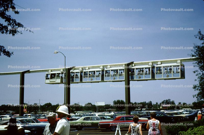 Monorail Trains, hanging passenger cars, Parking Lot, Tampa Florida, 1960s