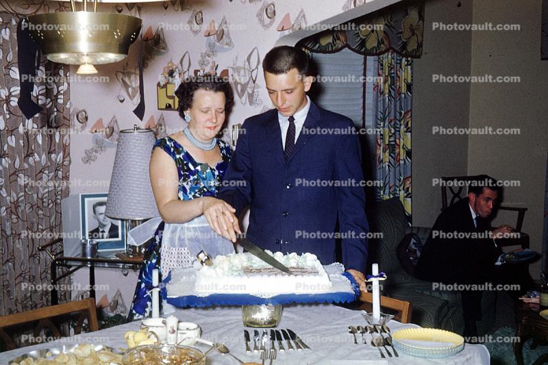 Birthday Cake Cutting, Woman Boy, Son, Suit and tie, table, candles, silverware, 1950s