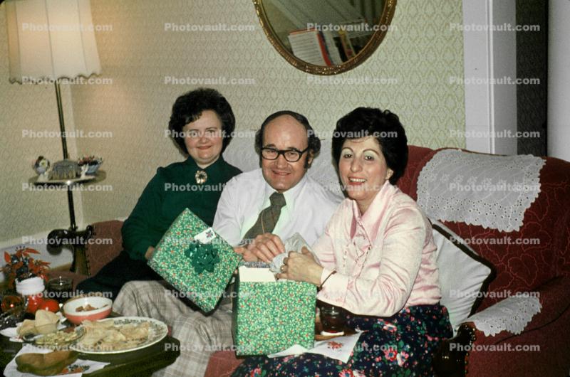 Opening Birthday Presents, man, woman, women, presents, smiles, food, Gifts, May 1976, 1970s