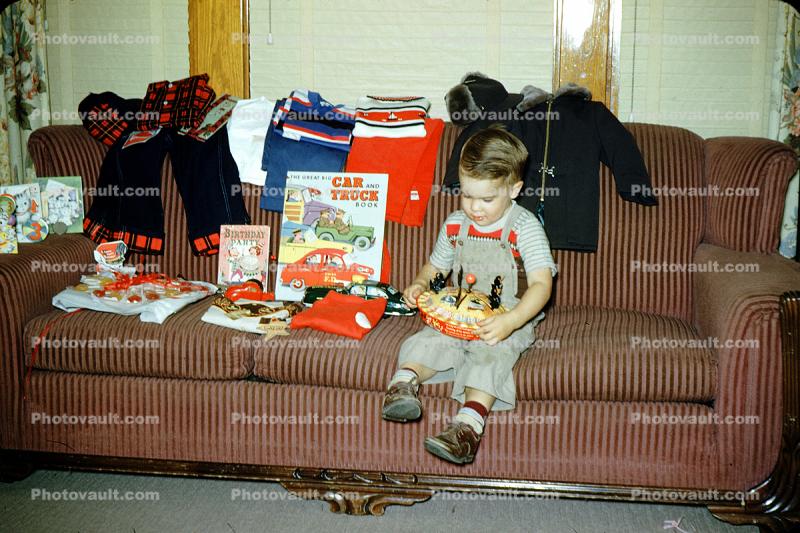 Boy on a Sofa with Birthday Gifts, 1950s