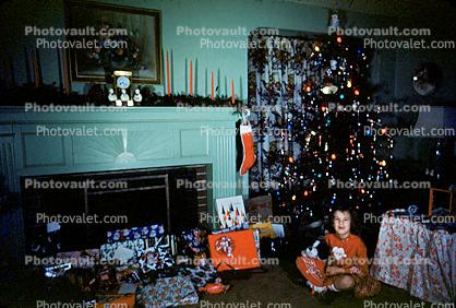 Tree, presents, girl, stocking, fireplace, candles, 1950s