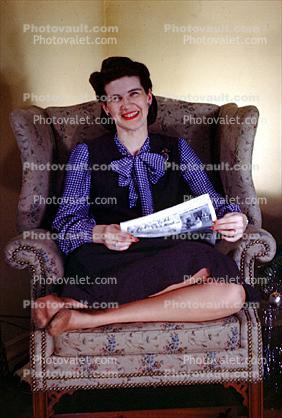 Woman, chair, smiles, 1940s