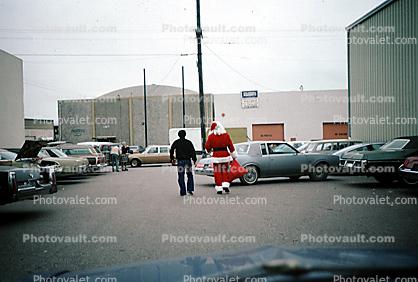 Santa Claus, Parked Cars, buildings