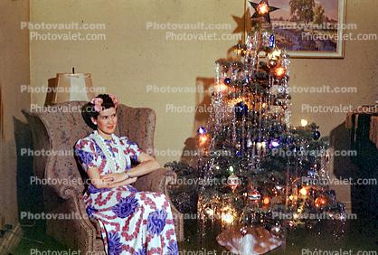 Christmas Tree decorated, decorations, woman sitting, 1940s