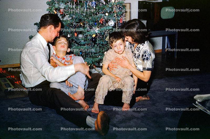 Christmas Tree decorated, decorations, woman sitting, boys, father mother, retro, 1940s