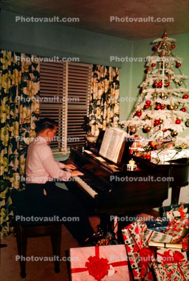 Man Playing Piano, Decorated Tree, 1950s