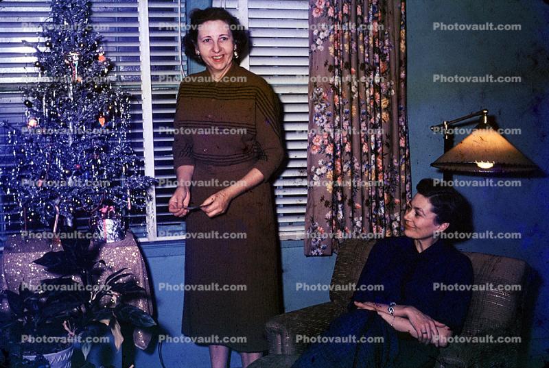 woman, smiles, tinsel tree, Presents, Decorations, Ornaments, Tree, Christmas Tree decorated, 1940s