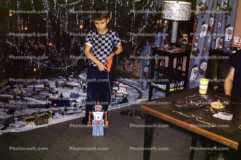 boy, robot, toy train, tree, presents, 1950s