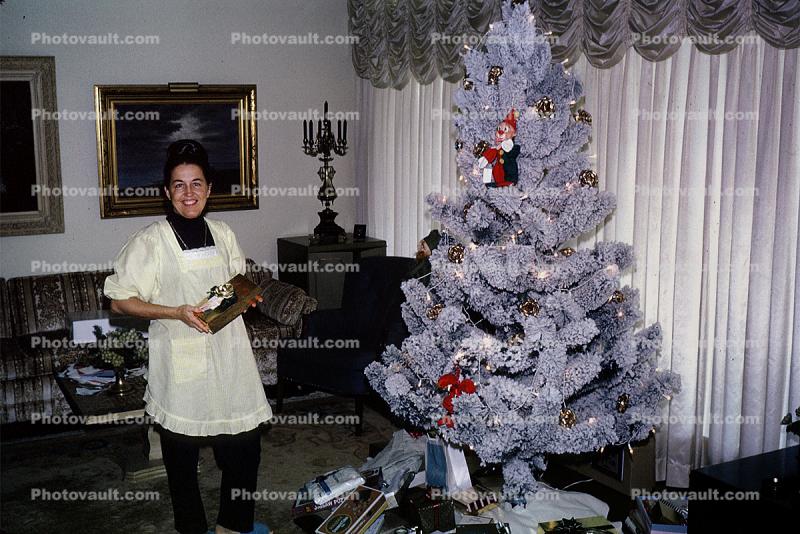 Tree, Frosted, Woman, Smiles, Happy, Apron, Presents, Decorations, Ornaments, drapes, curtain, 1960s