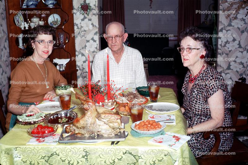 Christmas Dinner, turkey, table, plates, candles, 1950s