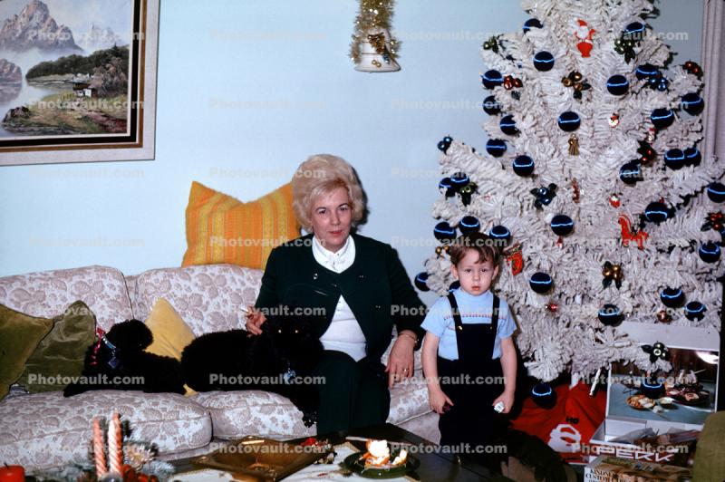 Woman, Boy, poodles, couch, Fake Tree, sofa, presents, December 1972, 1970s