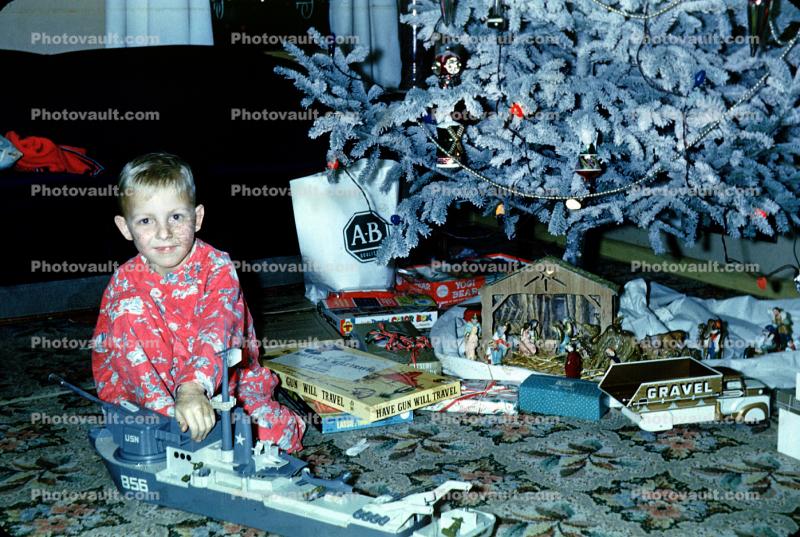 Boy, Navy combat ship, Truck, nativity scene, frosted tree, 1950s