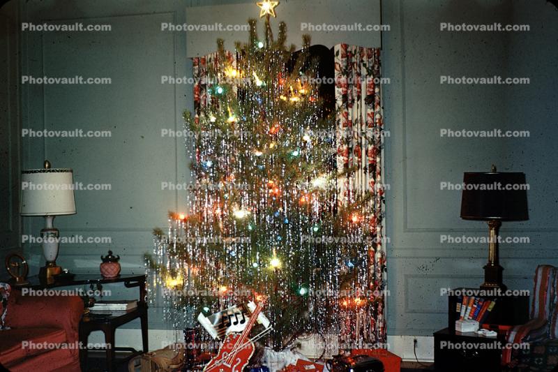 Decorated Christmas Tree, lamps, violin, 1950s
