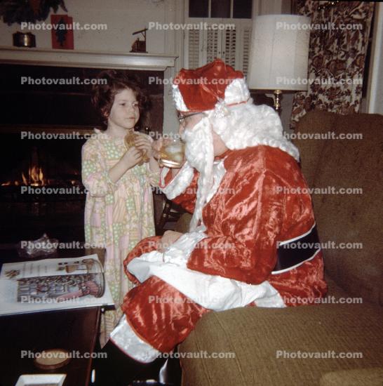 Girl talking with Santa Claus, pajama, suit, 1950s