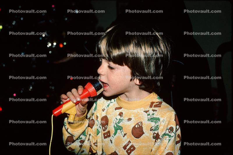 Boy Sings into a Microphone, 1980s