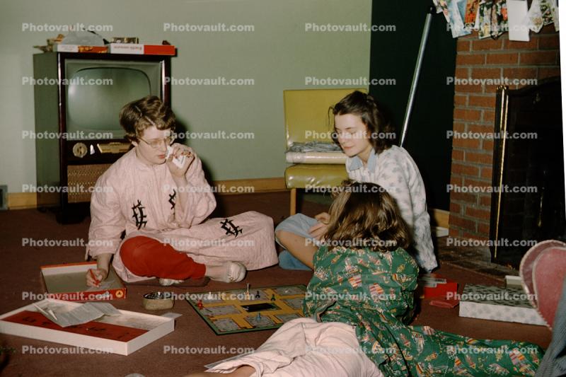 Presents, Television, girls playing a board game, pajama, 1950s