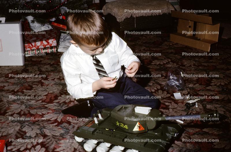 Boy with his new Army Tank, December 1964